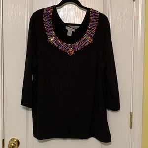 Long sleeve top, colorful beaded neckline.